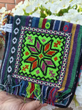 Mała boho torebka z Maroka z zielonym kwiatem